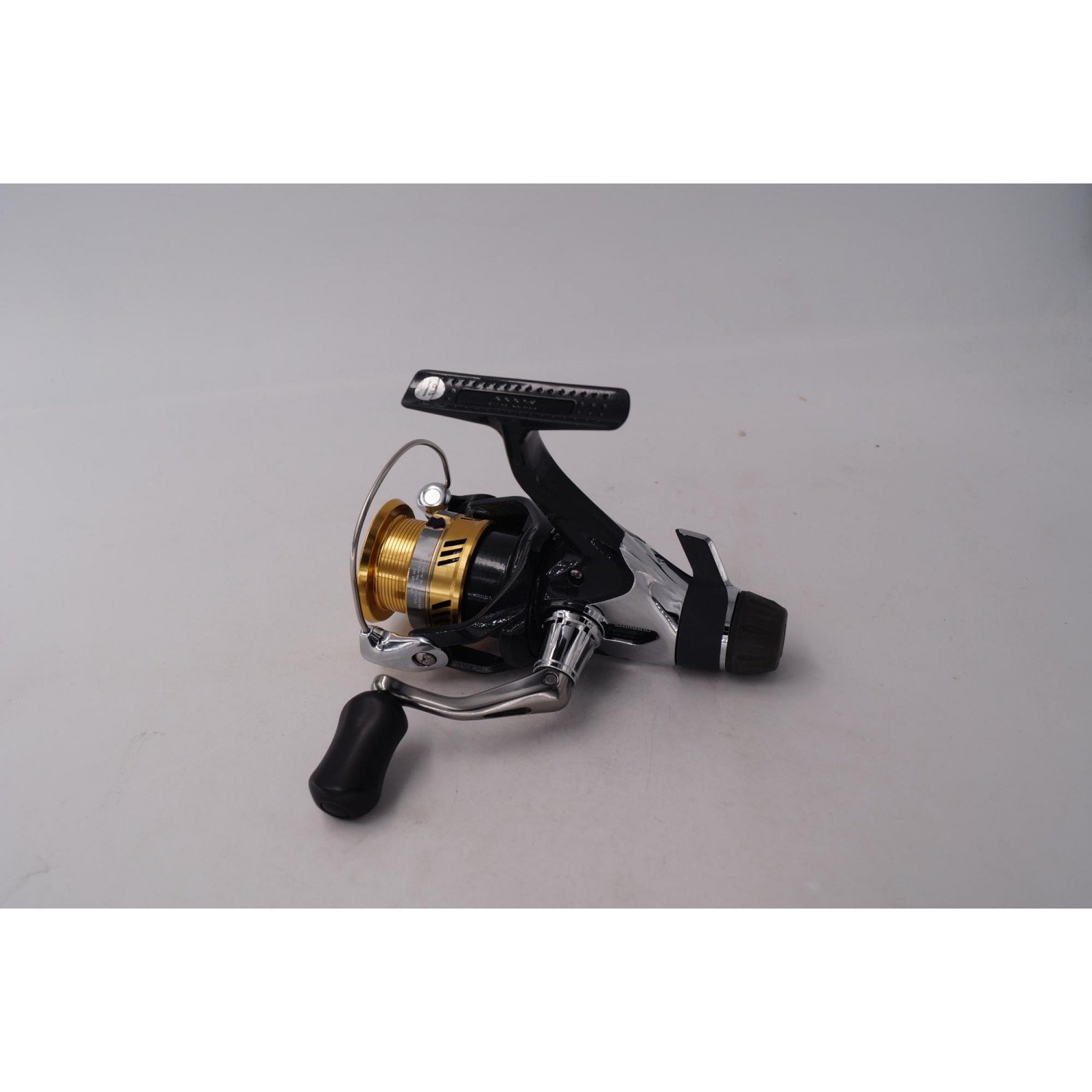 Shimano Sahara 1000 R, Spinning reel with rear drag, including spare spool,  noise while cranking